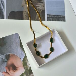 Elegant Gold and Green Necklace